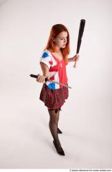 Tina STANDINGPOSE WITH DAGGER AND BASEBALL BAT 